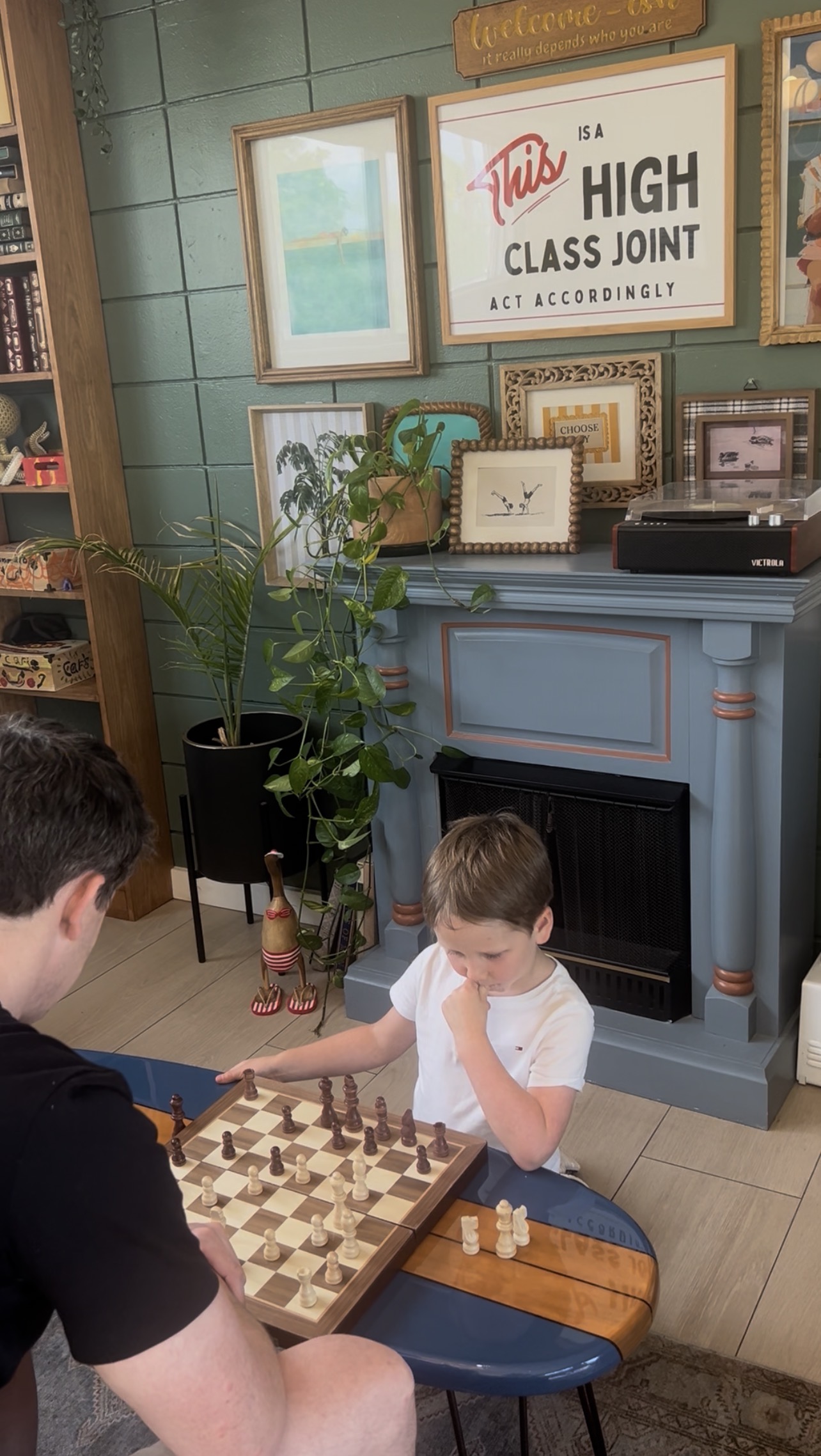A family chess game in The Happy Manatee's welcoming seating area.