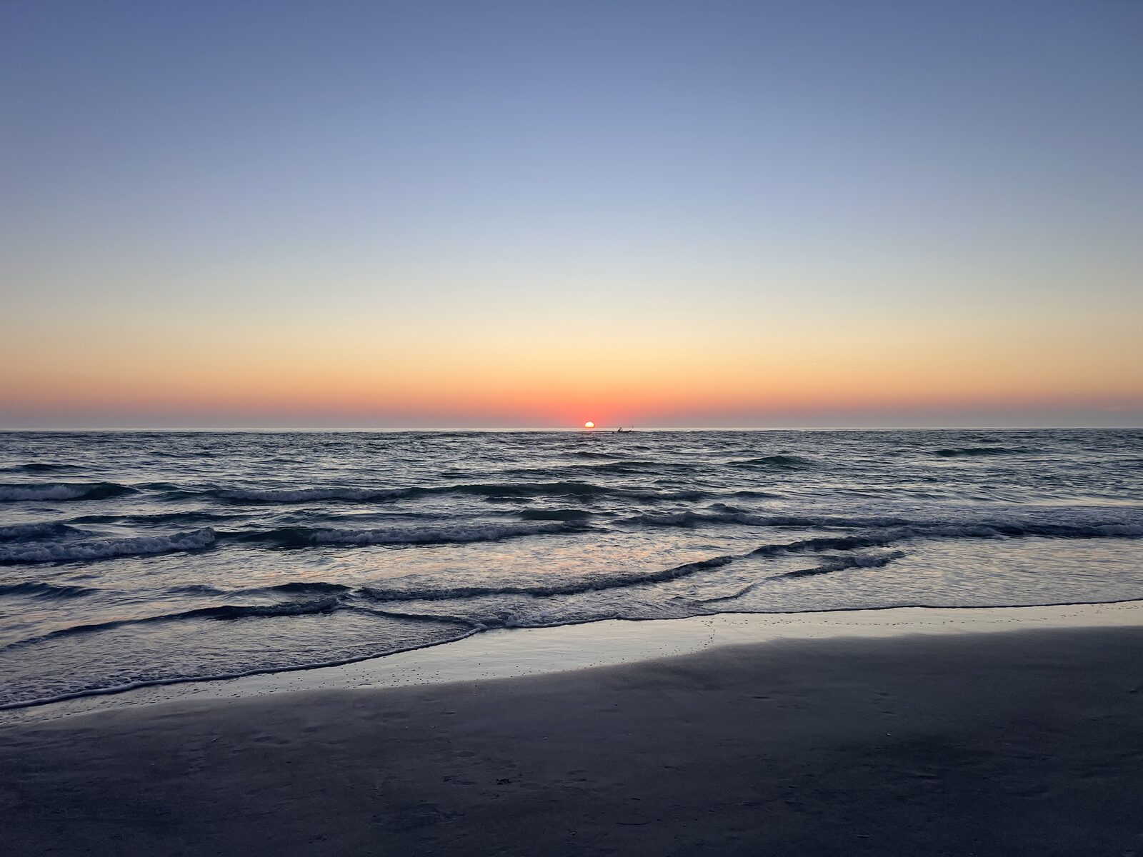 A legendary Gulf sunset — the unofficial close to every island day.